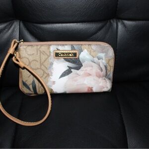 Calvin Klein Floral Wristlet in Tan and Cream